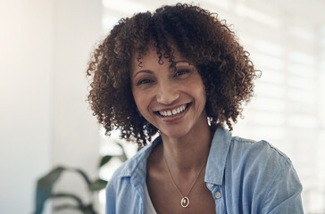 Home is my comfort zone. Shot of an attractive young woman enjoying a day at home alone.