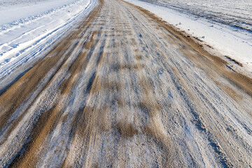 dangerous road in winter after snowfall,