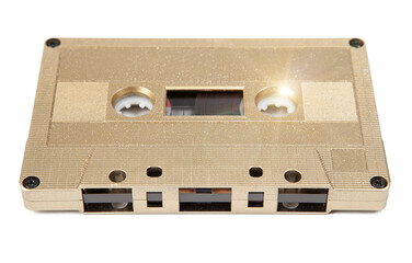 Obraz premium A golden cassette tape on the white background