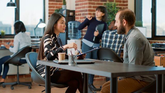 HR employee interviewing male applicant about work experience at recruitment meeting. Female recruiter and candidate attending job interview to talk about business employment.