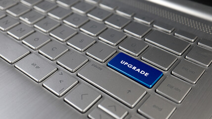 Keyboard with upgrade text on the enter button, represents upgrade, metaphor of signs