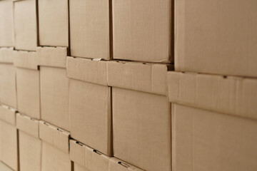 Set of cardboard brown boxes in storehouse. Background of carton boxes in wsrehouse