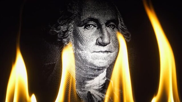 Portrait of George Washington on a black background in flames. Conceptual 4k slow motion video. The idea of ​​a financial crisis.