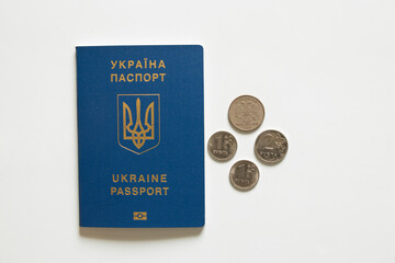 Foreign Ukrainian passport and Russian rubles lie nearby on a white background, economy and tourism, sanctions in Russia