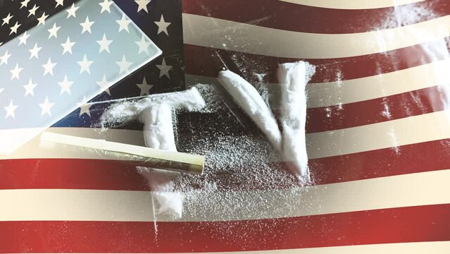 1 US dollar bill, rolled into a tube, falls on white powder in the form of the letters TV on the background of a waving US flag. Conceptual 4k video. The idea of ​​fakes, lies in the media.