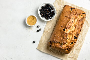 Banana black currant loaf cake. Top view, copy space.
