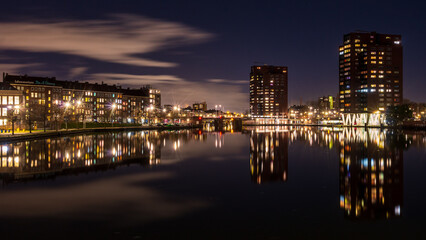 Naklejka premium Coolhaven during the evening with the lights of the apartments reflecting in the water, Rotterdam, Netherlands