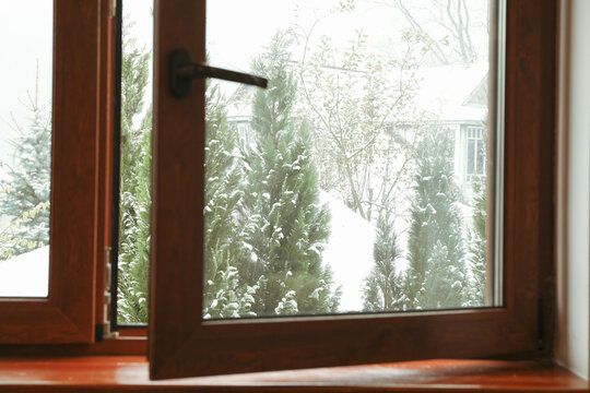 Open window with view on snowy day