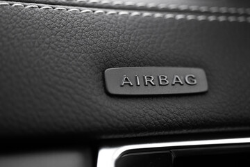 Safety airbag sign on car, luxury sport car interior background - obrazy, fototapety, plakaty