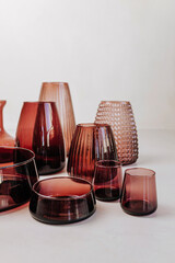 Image of stylish vases, plates and tableware for home. Home interior 