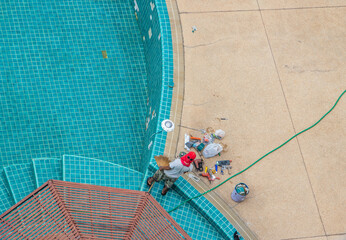 Renovation, maintenance, repair, and tiling work of a swimming pool	