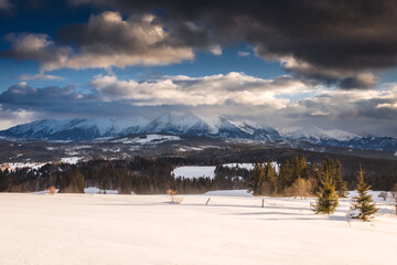Winter view of the High Tatras from the surrounding fields. Photo taken during the golden hour