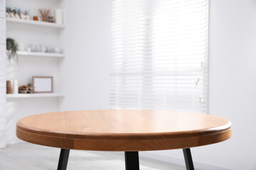 Empty wooden table indoors, closeup. Stylish furniture