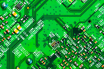 Close up of components and microchips on PC circuit board.