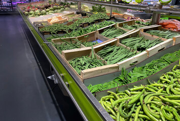 counters in a supermarket with vegetables and fruits. Shopping in a supermarket.