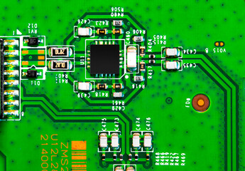 Close up of components and microchips on PC circuit board.