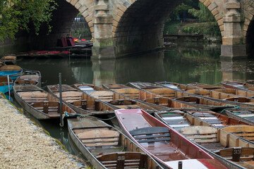 University punts moored up at 'The Head of the River', Oxford