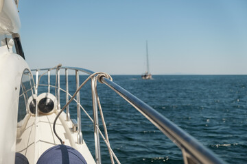 Fototapeta na wymiar Motor yacht sailing in the sea. Cruise on the yacht at summer