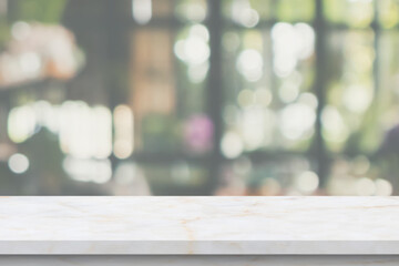 marble table top with blurred kitchen cafe restaurant interior background