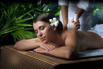 portrait of young beautiful woman in spa environment.   - 493210778