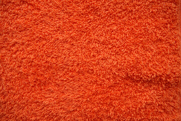 Orange color bath towel texture.