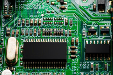 Close up of components and microchips on PC circuit board.