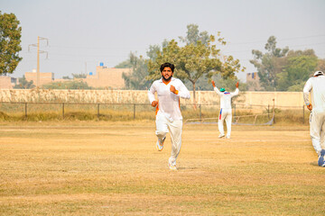 Obraz premium young man player playing cricket
