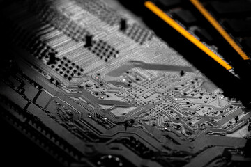 Macro Close up of computer RAM chip and motherboard