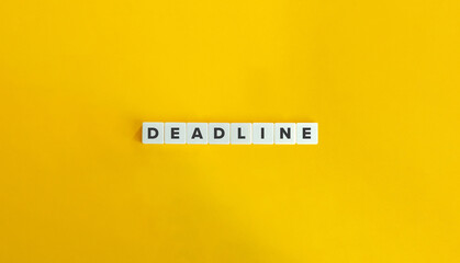 Deadline Word on Letter Tiles on Yellow Background. Minimal Aesthetics.