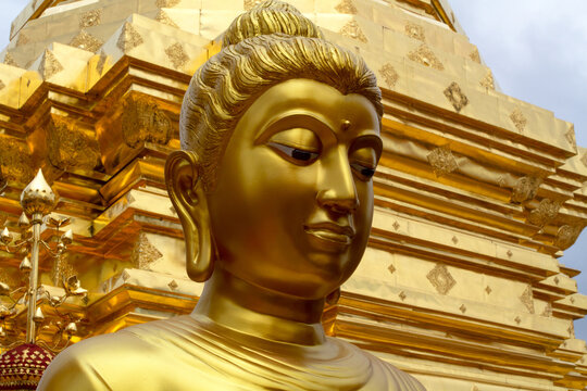 golden buddha statue close-up