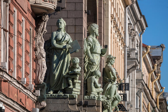 Sculptures on the facade of the Akimov Theater in the city of St. Petersburg
