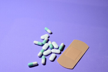 Tablets and strips, on light background. Conceptual, copy space.