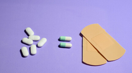 Tablets and strips, on light background. Conceptual, copy space.