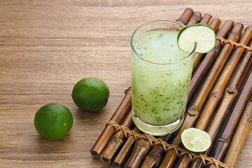 Es Timun Serut, a typical Indonesian drink made from shaved cucumber with syrup, lime and basil seeds. Popular during ramadan. 
