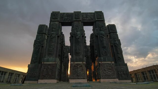 Timelapse view of Monument History of Georgia, North of Tbilisi. Dramatic gray weather, overcast sky. Day time. Summer. Travel and Vacation, tourism concept. Viewpoint, interesting places