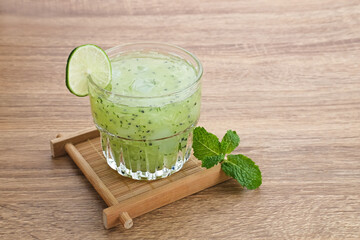 Es Timun Serut, a typical Indonesian drink made from shaved cucumber with syrup, lime and basil seeds. Popular during ramadan. 
