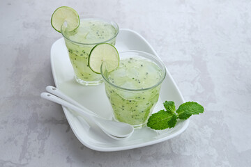Es Timun Serut, a typical Indonesian drink made from shaved cucumber with syrup, lime and basil...