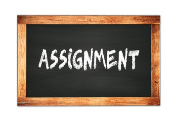 ASSIGNMENT text written on wooden frame school blackboard.