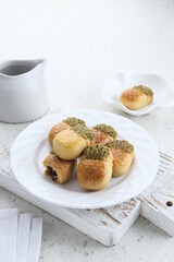 Nastar Cookies, Taiwanese Pineapple Cookies with pineapple-shaped filled with jam. Served on plate.