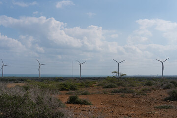Wind farm in the desert by the sea in La Guajira, Colombia