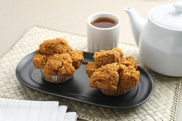 Bolu Kukus Gula Jawa (brown sugar steamed sponge cake), a traditional snack from Indonesia made from flour, egg, brown sugar, and salt. 
