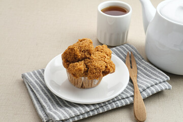 Bolu Kukus Gula Jawa (brown sugar steamed sponge cake), a traditional snack from Indonesia made from flour, egg, brown sugar, and salt. 
