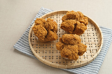 Bolu Kukus Gula Jawa (brown sugar steamed sponge cake), a traditional snack from Indonesia made from flour, egg, brown sugar, and salt. 
