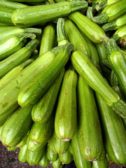 Zucchinis (courgettes) on a farmers market stall in the Aegean coastal town Bodrum, Turkey.        