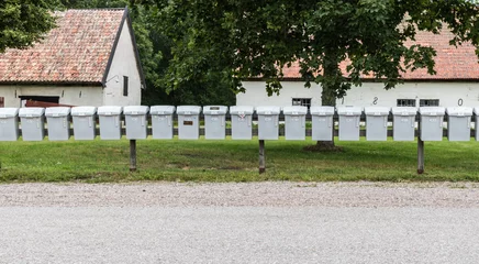 Photo sur Plexiglas Europe du nord Forsmark, Osthammar - Sweden -  Row of identical postboxes