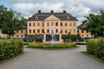 Fototapeta na wymiar Lovstabruck, Osterlovsta - Sweden - 7 31 2019 Decorated park and surroundings of the mansion