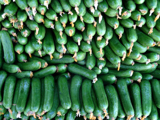 Turkish Cengelkoy cucumbers on a market stall in Cengelkoy, Istanbul, Turkey.        