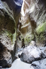 Panorama of the narrow mountain Karadakh gorge with sunlight in Dagestan. Russia June 2021.