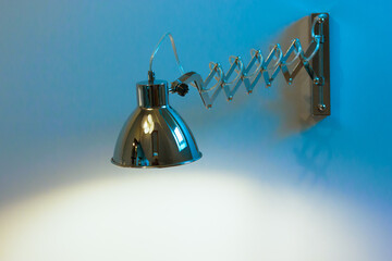 Wall sconce lamp. Adjustable swing long arm wall light. Lighting in loft style.