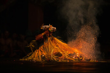 Man performing traditional Indonesian dance at Ubud Palace Bali theater at night - Bali, Indonesia